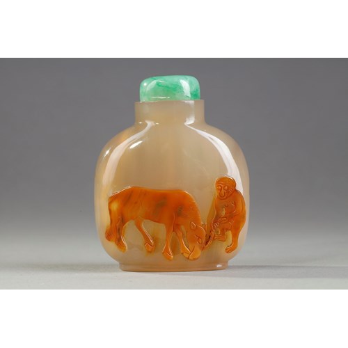 Agate snuff bottle carved in the light brown vein of a horse and a monkey